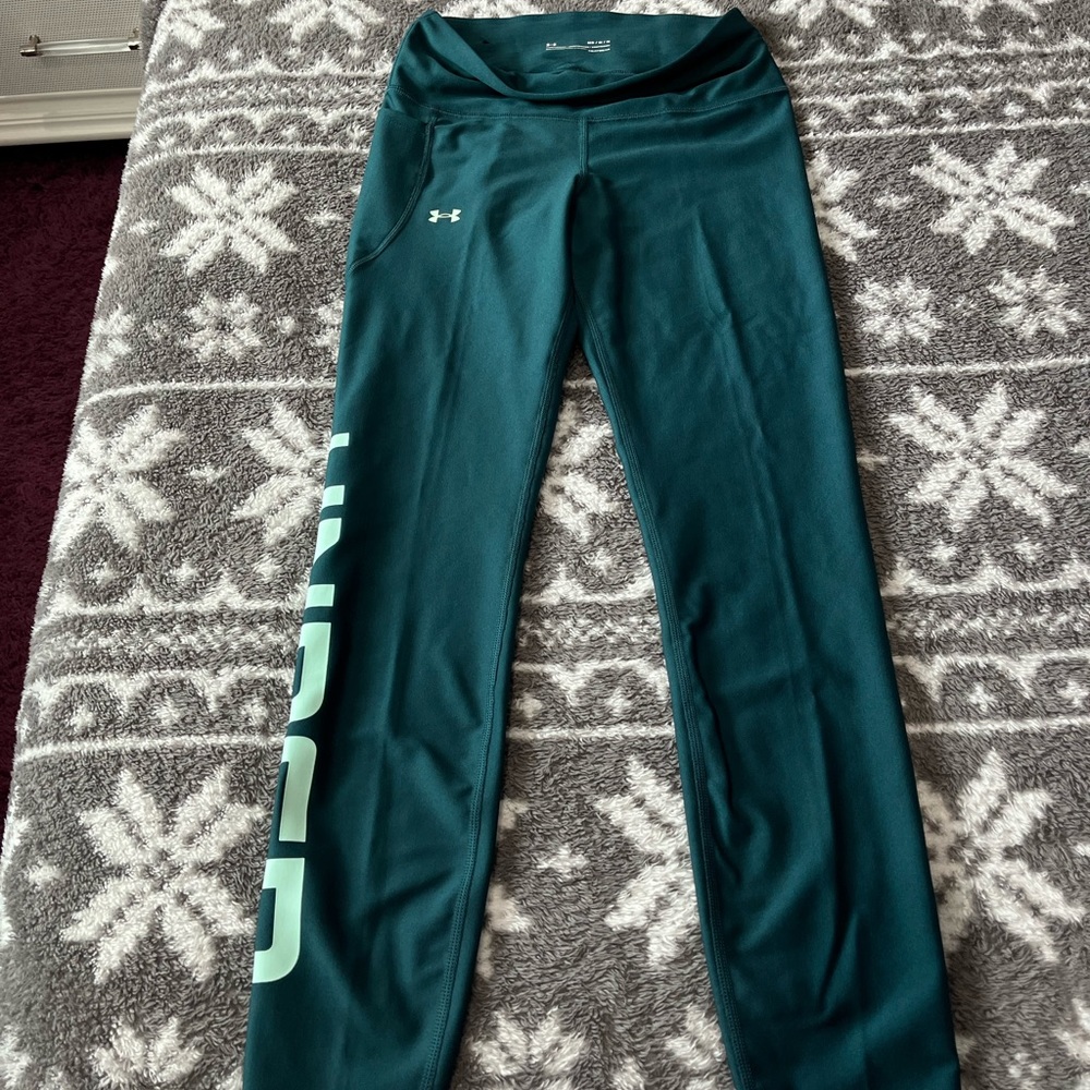 UA womens leggings in teal color.